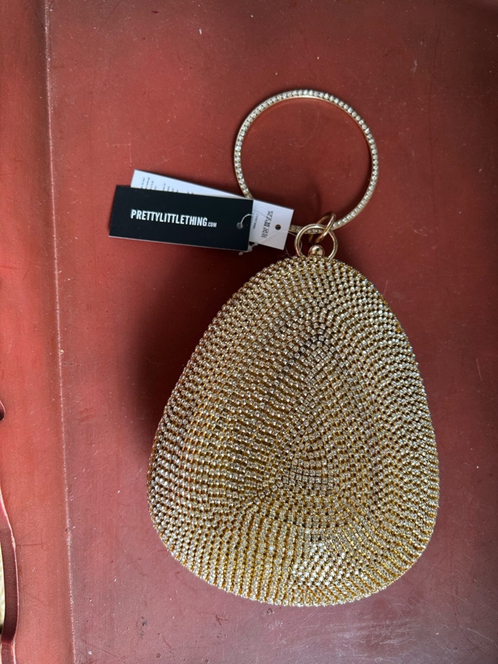 PrettyLittleThing Gold Crystal Ring Wristlet Clutch